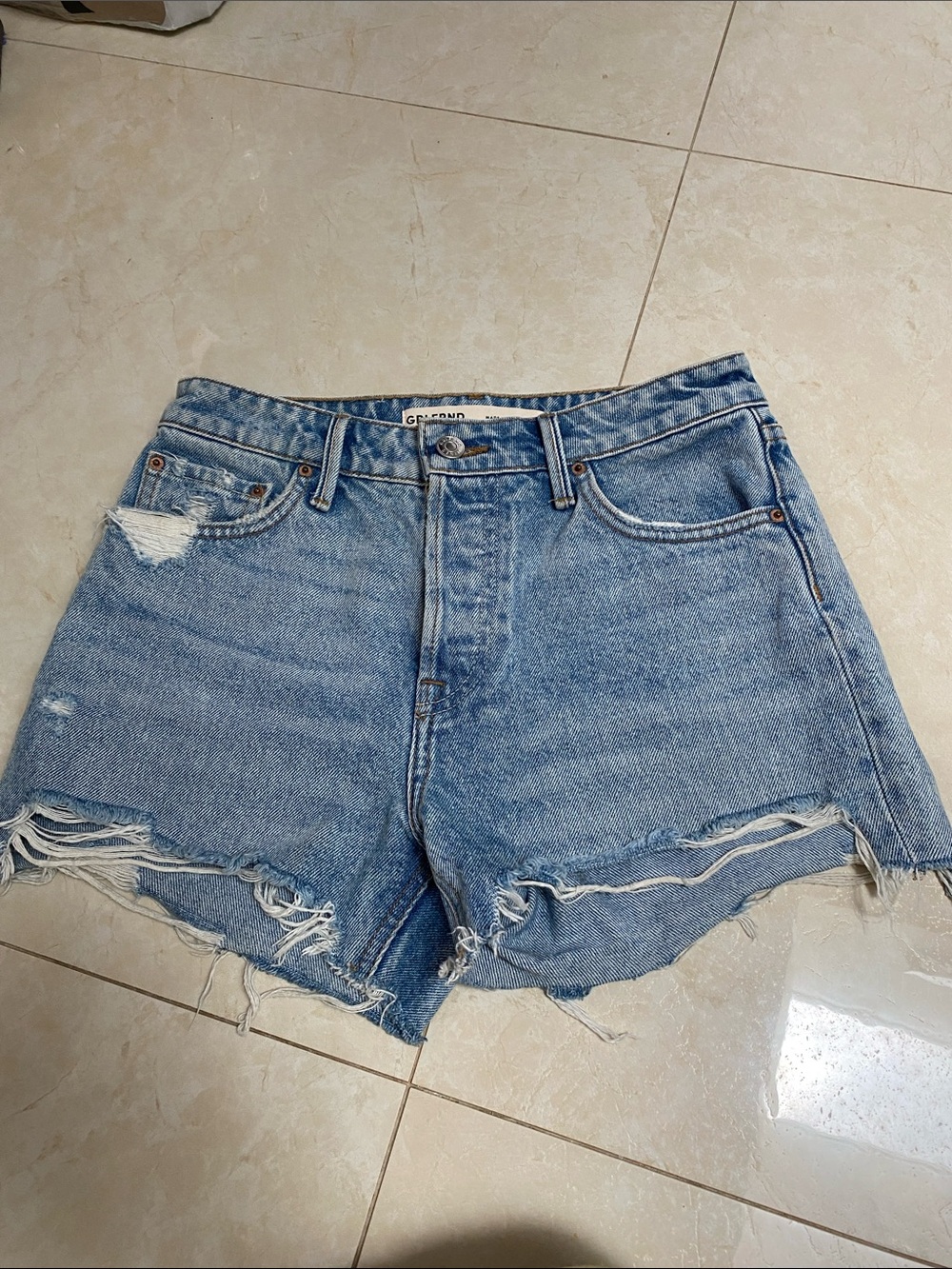 The GRLFRND Helena High Rise Cut Off Denim Shorts 24